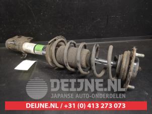 Mitsubishi Colt Schokdemperpoot links-voor O747018 foto 2