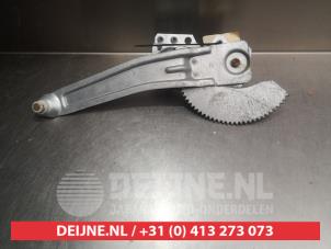 Mazda Demio Fenstermechanik 4-türig rechts hinten O291056 foto 2
