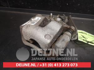 Kia Ceed Sportswagon Rear brake calliper, left O747234 photo 2