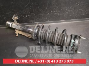 Mazda 2 Stoßdämpferstrebe links vorne O747604 foto 2
