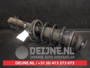 Toyota Yaris Front shock absorber rod, left O748368 photo 2