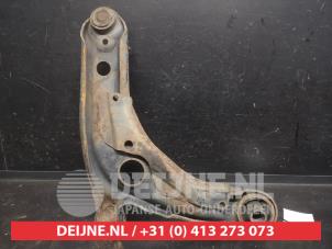 Toyota Yaris Querlenker unten links vorne O748370 foto 2