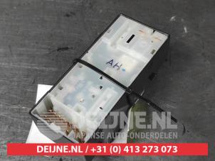 Nissan Micra Multi-functional window switch O748523 photo 2