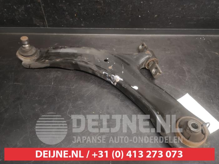 Nissan Qashqai+2 Draagarm onder links-voor O748775