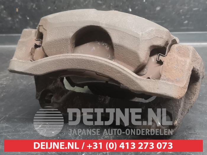 Nissan Qashqai+2 Bremszange rechts vorne O748780