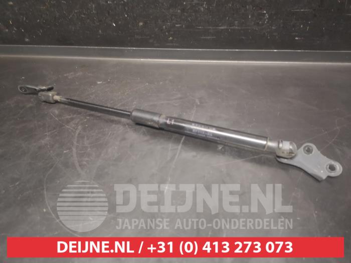 Toyota Aygo X Rear gas strut, left O749344