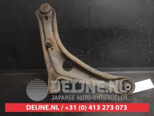 Toyota Yaris Querlenker unten links vorne O749381 foto 2