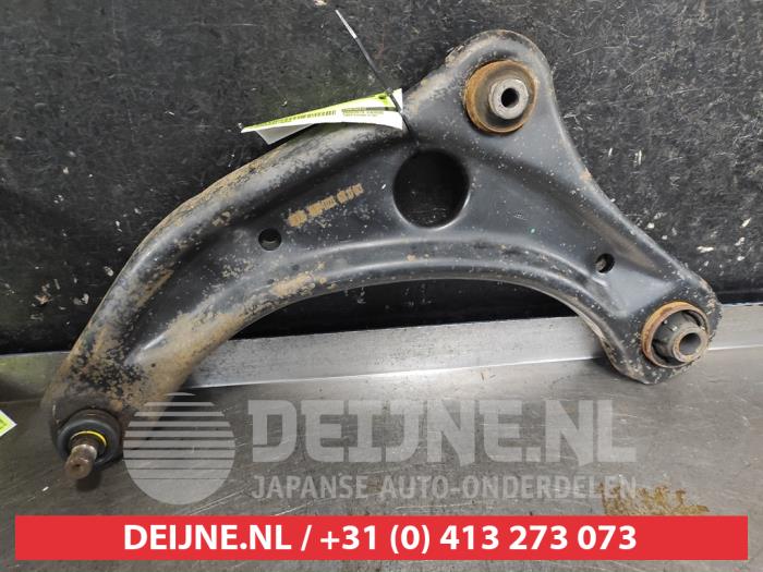 Nissan Micra Draagarm onder links-voor O749655