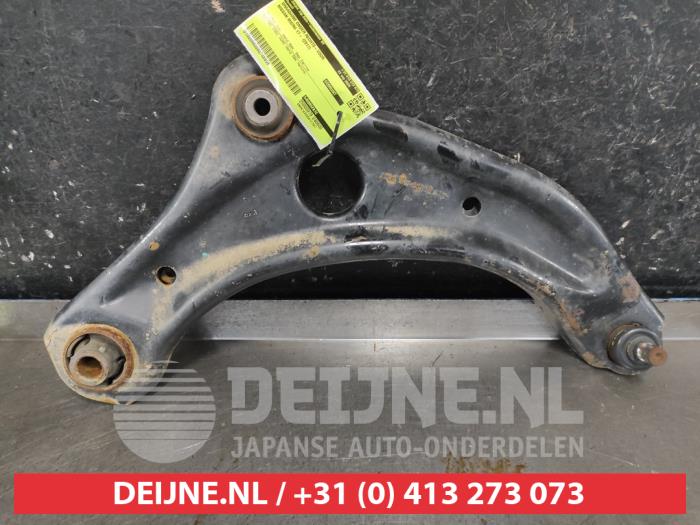 Nissan Micra Draagarm onder rechts-voor O749656