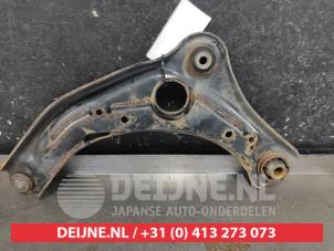Nissan Micra Front lower wishbone, right O749656 photo 2