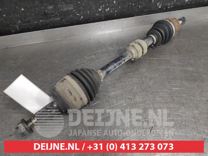 Nissan Micra Aandrijfas links-voor O749660