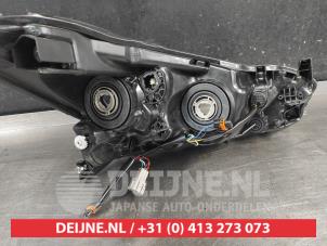 Nissan Micra Scheinwerfer links O749810 foto 2