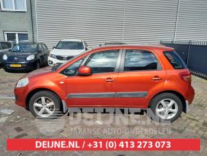 Suzuki SX-4 Kotflügel links vorne O750108 foto 2