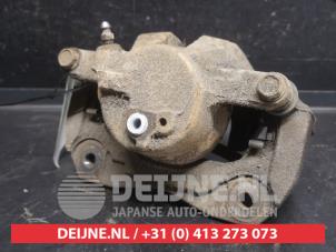 Toyota Prius Plus Bremszange links vorne O750255 foto 2