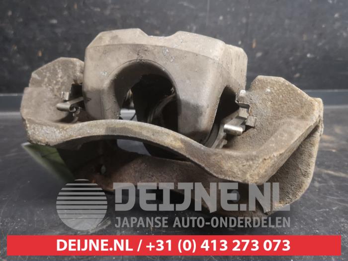 Toyota Prius Plus Bremszange links hinten O750256