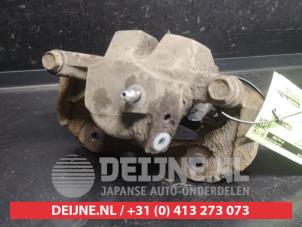 Toyota Prius Plus Rear brake calliper, left O750256 photo 2