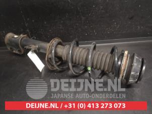 Suzuki SX-4 Schokdemperpoot rechts-voor O750389 foto 2