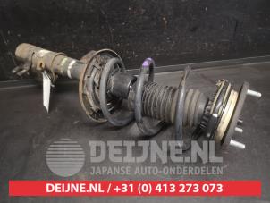 Mazda 3 Schokdemperpoot links-voor O750570 foto 2