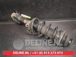 Toyota Yaris Stoßdämpferstrebe links vorne O752579 foto 2