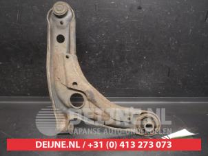 Toyota Yaris Querlenker unten links vorne O752581 foto 2