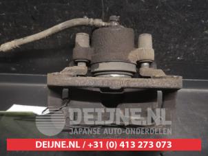 Toyota Yaris Bremszange links vorne O752583 foto 3