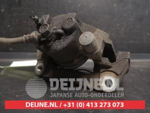 Toyota Yaris Bremszange links vorne O752583 foto 2