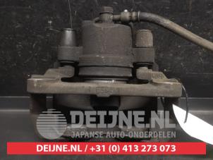 Toyota Yaris Bremszange rechts vorne O752584 foto 3