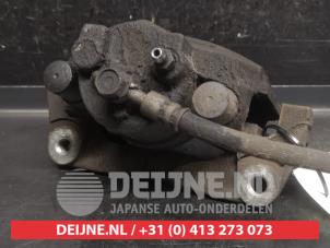 Toyota Yaris Bremszange rechts vorne O752584 foto 2