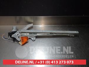 Subaru Justy Window mechanism 4-door, front left O275704 photo 2