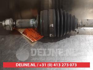 Subaru Justy Antriebswelle rechts vorne O319347 foto 2
