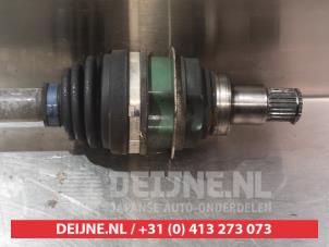 Subaru Justy Antriebswelle rechts vorne O319347 foto 3