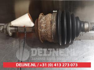Suzuki Swift Aandrijfas rechts-voor O319957 foto 2