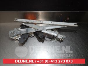 Ssang Yong Musso Fenstermechanik 4-türig links hinten O290621 foto 2