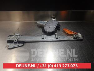 Mitsubishi Pajero Fenstermechanik 4-türig links hinten O290702 foto 2