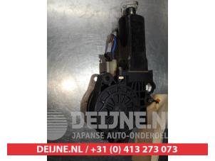 Hyundai Trajet Raammotor Portier O292069 foto 2