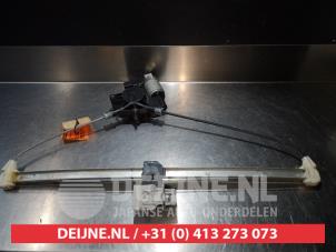 Mazda 2 Ruitmechaniek 4Deurs links-achter O290290 foto 2