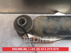 Mitsubishi Pajero Schokdemper links-achter O378639 foto 2