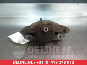 Daihatsu Charade Remklauw (Tang) links-voor O325402 foto 2