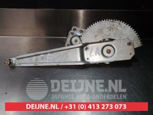 Mazda 323 Ruitmechaniek 4Deurs links-achter O290250 foto 2