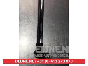 Daihatsu Sirion Gasdemper links-achter O294273 foto 3