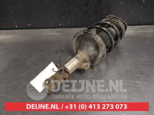 Kia Rio Schokdemperpoot links-voor O320700 foto 2