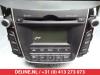 Radio van een Hyundai i30 (GDHB5), 2011 1.6 CRDi Blue Drive 16V VGT, Hatchback, Diesel, 1.582cc, 81kW (110pk), FWD, D4FB, 2011-12 / 2016-12, GDHB5D5; GDHB5D6; GDHB5DD; GDHB5DE 2012