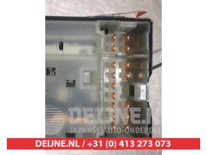 Nissan Micra Multi-functional window switch O311717 photo 2