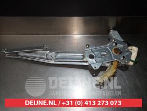 Suzuki Ignis Fenstermechanik 4-türig links vorne O275981 foto 2