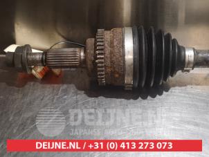 Suzuki Swift Aandrijfas links-voor O318481 foto 2