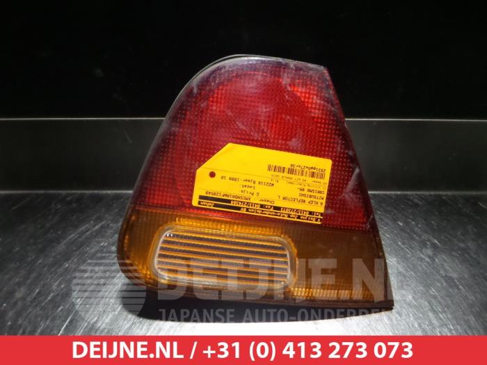 Mitsubishi Carisma Achterklep reflector links O297002