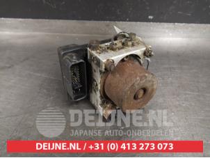 Gebruikte ABS Pomp Mazda 323 (BJ12) Prijs € 35,00 Margeregeling aangeboden door V.Deijne Jap.Auto-onderdelen BV