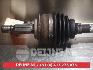 Toyota Yaris Aandrijfas links-voor O318639 foto 2