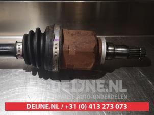 Toyota Yaris Aandrijfas links-voor O318639 foto 3