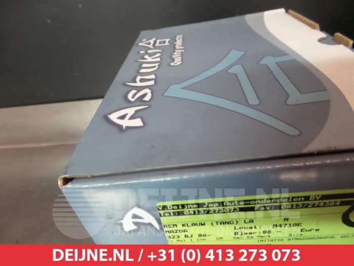 Mazda 323 Bremszange links hinten O65197